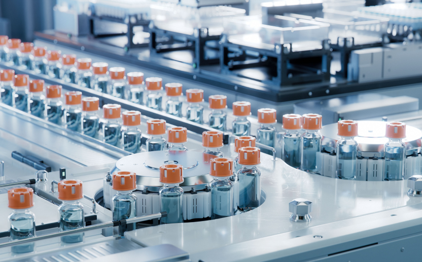 View of an automated line filling medical vials, showcasing strict quality and compliance management.